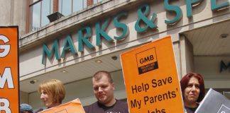 Workers from Marks and Spencer supplier Fenland Foods demonstrate with their children outside a London M&S store – the banking crisis poses a grave threat to millions of workers’ jobs