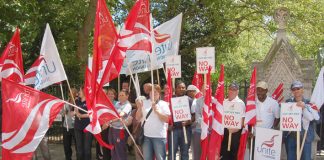 Members of Unite assemble for a demonstration in central London during national strike action by local government workers in July