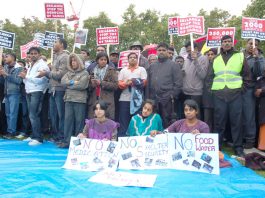 Tamils with their posters depicting the horrors of the Rajapakse government’s war on the Tamil people in Sri Lanka