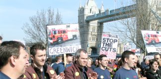 Firefighters demonstrating against cuts to the fire service in London. Their union warns that the cuts are endangering lives