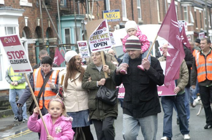 Postal workers and their families marched against the closure of Crewe Mail Centre last month. Another large demonstration is expected in Milton Keynes today