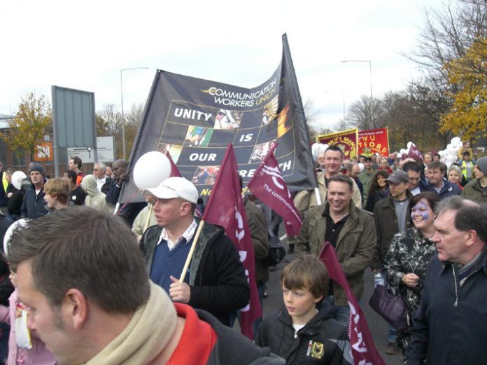 A section of the 300-strong march of postal workers, their families and supporters defending the Milton Keynes Mail Centre on Saturday