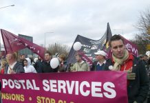 Royal Mail workers marching through Milton Keynes against plans to close their Mail Centre and condemning the Brown government for its privatisation policies