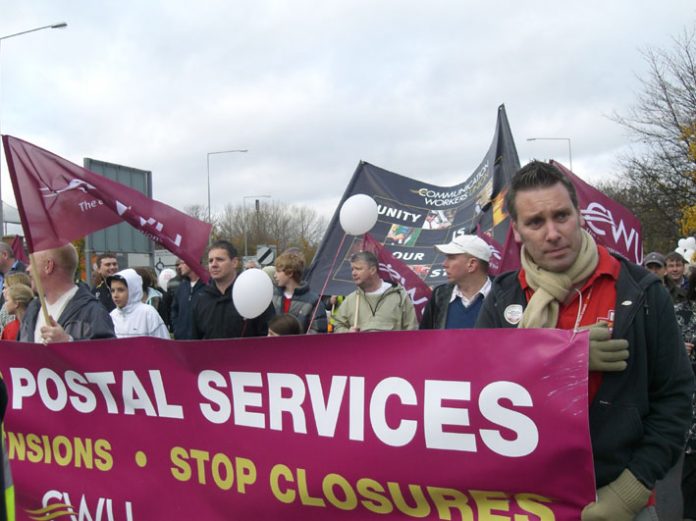 Royal Mail workers marching through Milton Keynes against plans to close their Mail Centre and condemning the Brown government for its privatisation policies