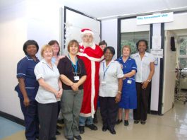 Chase Farm picket ‘Father Christmas’  brought good wishes to maternity department staff