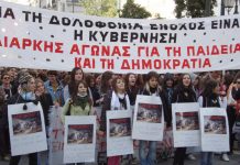 School youth lead a mass demonstration through Athens in protest at the police shooting of 15-year-old Alexis Grigoropoulos