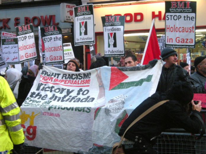 A section of the angry picket opposite the entrance to the Israeli embassy yesterday demanding an end to the Zionist ‘holocaust’