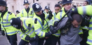 Police brutally arrest a demonstrator during last Saturday’s march against the Israeli  atrocities in Gaza