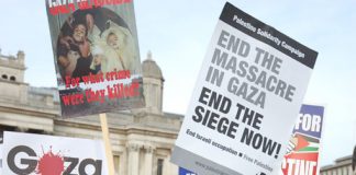 Young demonstrators during a mass protest in Trafalgar Square on Saturday against the Israeli war on Gaza, shortly before Israel announced it would withdraw