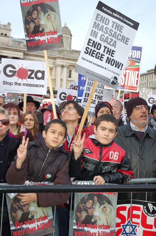 Young demonstrators during a mass protest in Trafalgar Square on Saturday against the Israeli war on Gaza, shortly before Israel announced it would withdraw