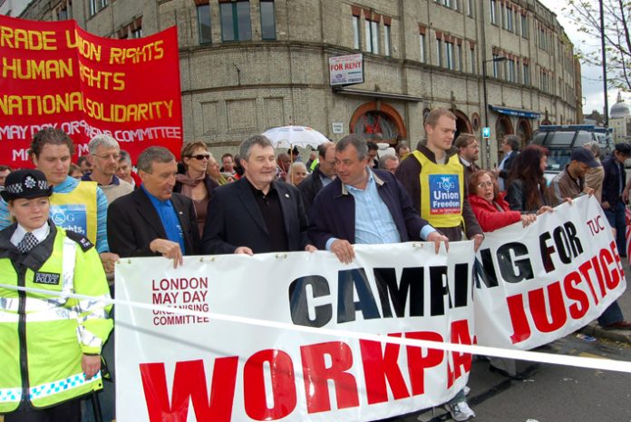 Unite leaders WOODLEY and SIMPSON (left of picture), on the London May Day march, were yesterday unable to give a