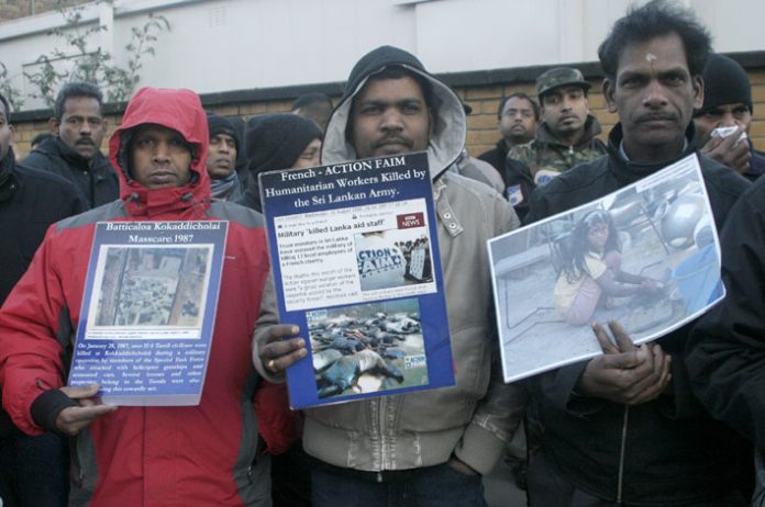 Tamils demonstrating outside the BBC over its silence while the Rajapakse regime in Sri Lanka continues the killing and bombing of Tamil areas, which is causing casualties on a daily basis and forcing more people to flee their homes