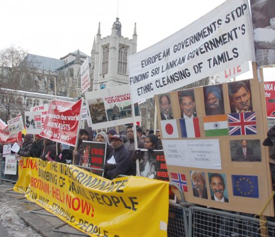 Demonstrators in Parliament Square held banners and placards condemning the silence of world leaders