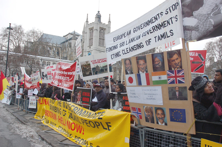 Demonstrators in Parliament Square held banners and placards condemning the silence of world leaders