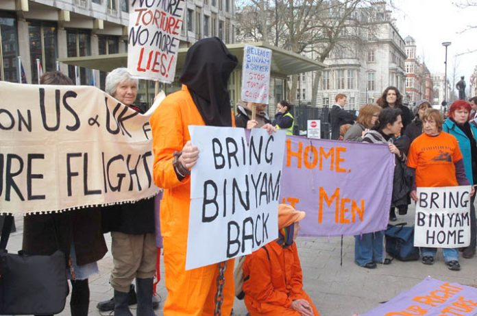 Demonstrators outside the US embassy in Grosvenor Square, London demanding the immediate release of Binyam Mohamed from Guantanamo Bay