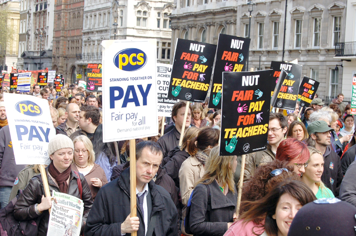 Local government workers marching in London during the national pay strike of the NUT, PCS and UCU unions