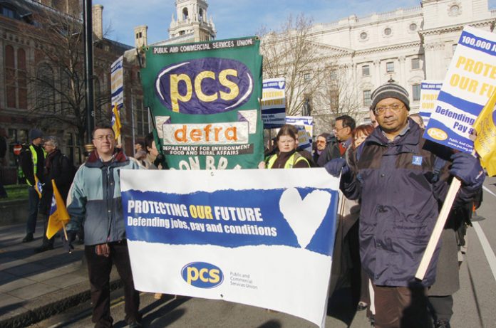 Civil servants marching in Whitehall against the onslaught on their jobs