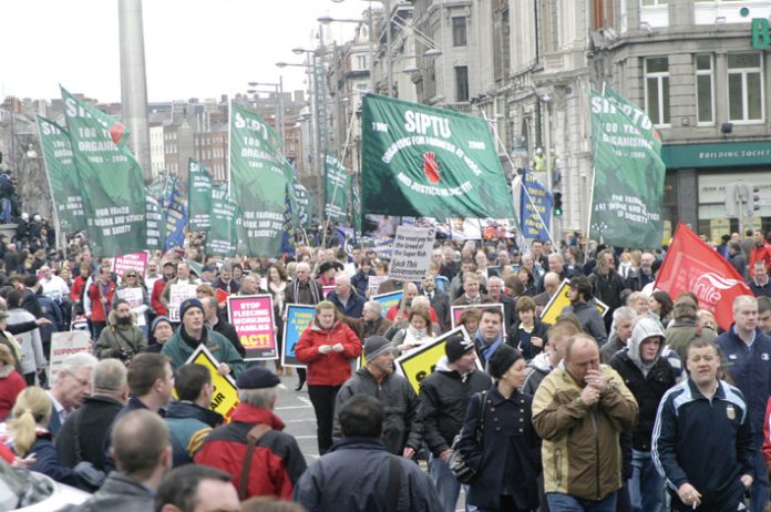 SIPTU banners on the 125,000-strong demonstration in Dublin on February 21 against wage cuts and job losses