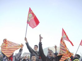 Tamils protesting against genocide on Westminster Bridge on January 31 when 125,000 marched in London against the Sri Lankan army attacks