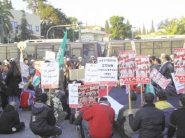 Greek riot police confront a demonstration outside the Israeli embassy in Athens