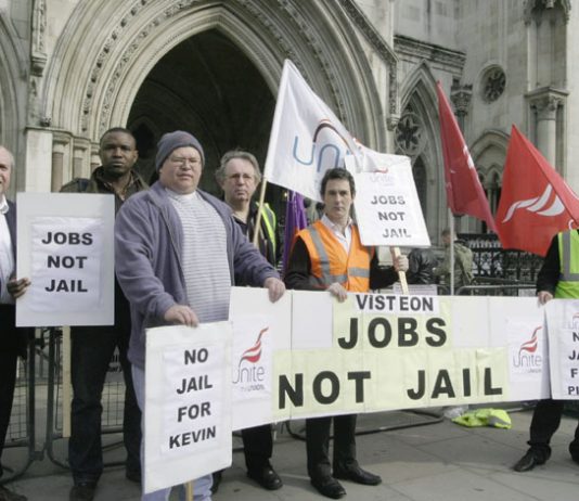 Unite members outside the High Court yesterday demonstrating for jobs and opposing the attempt to jail the leaders of the Enfield occupation