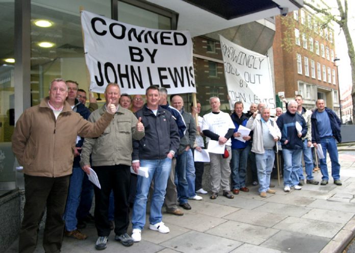 Sacked Stead McAlpin and Birtwistle workers outside John Lewis offices in London yesterday