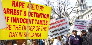 Tamils continuing their demonstration outside Parliament yesterday against the slaughter of Tamils by the Sri Lankan armed forces