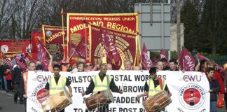 Postal workers marching in Wolverhampton against Royal Mail privatisation
