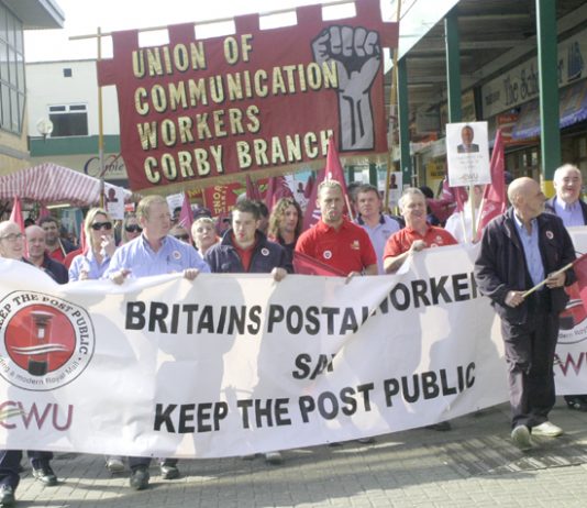 Postal workers marching through Corby on March 20th against local MP Phil Hope reneging on his promise to oppose privatisation