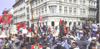 Tamils sat in the street outside Parliament to protest against the slaughter of 2000 civilians in 24 hours last week