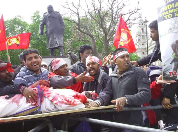 Young Tamils outside Parliament re-enacting the butchery of the Sri Lankan Army against the Tamil people