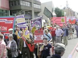UCU, Unison and PCS members marching past London Met in Holloway Road