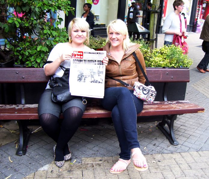 CHRISTINE O’DONNELL (holding  News Line) with a friend in Luton town centre