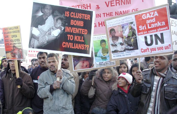 Demonstrators marching in London on January 31st condemn the UN refusal to stop the Rajapakse regime’s genocidal attacks on the Tamil people