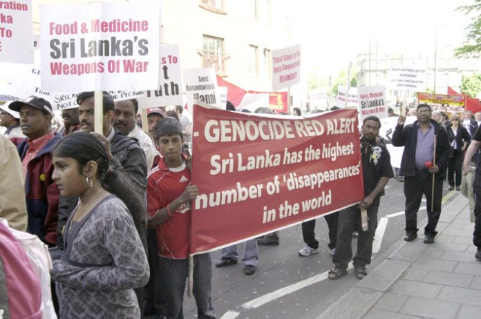 Tamil marchers in London on May Day condemn the atrocities of the Sri Lankan regime