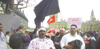 Tamil protesters in Parliament Square depict the Sri Lankan army atrocities against the Tamil people