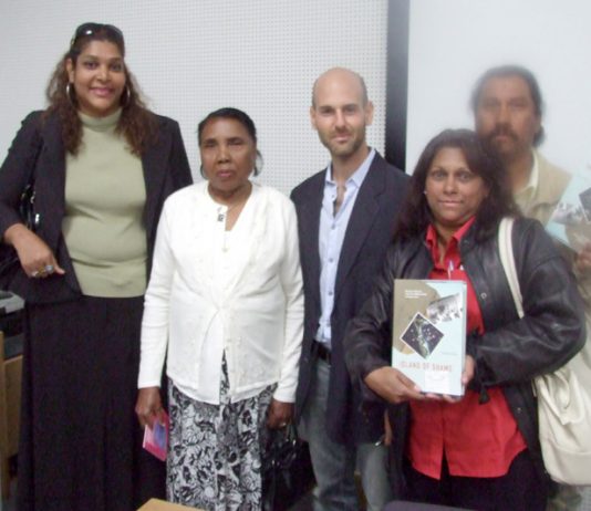 HENGRIDE PERMAL, chair of the Chagos Islands Community Association (left) with fellow Chagossians and author DAVID VINE (centre) at the book launch in Crawley last Friday night