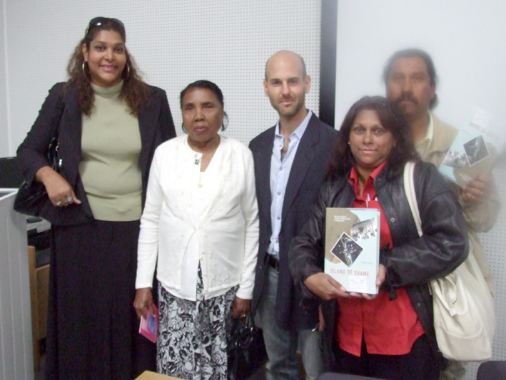 HENGRIDE PERMAL, chair of the Chagos Islands Community Association (left) with fellow Chagossians and author DAVID VINE (centre) at the book launch in Crawley last Friday night