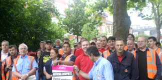Confident pickets at the Hampstead Delivery Office on Wednesday morning said they are determined to defend their wages and conditions
