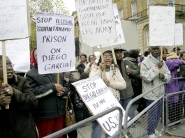 Chagos Islanders demonstrate outside Downing Street in November 2007 demanding to return to their home in Diego Garcia