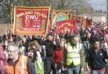 Postal workers marching in Wolverhampton against privatisation. Stoke postal workers are on strike against plans for them to travel to work in Wolverhampton – a 75 mile round trip