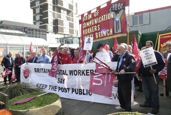 Postal workers demonstrating in Corby earlier this year against the closure of their Mail Centre