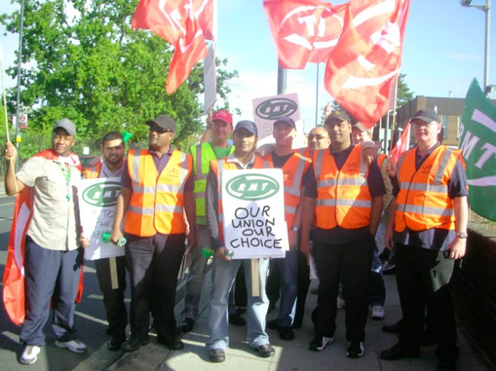 RMT busworkers demonstrate outside Fulwell Bus garage in west London against harassment by London United management