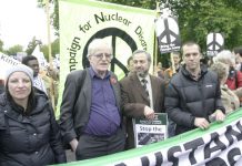 Lance Corporal JOE GLENTON (far right) and his wife CLARE (left) with PETER BRIERLEY (second from left) whose son Shaun was killed in Iraq, leading off the October 24th march in London against the war on Afghanistan