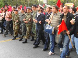 Students and conscript soldiers at the front of the demonstration