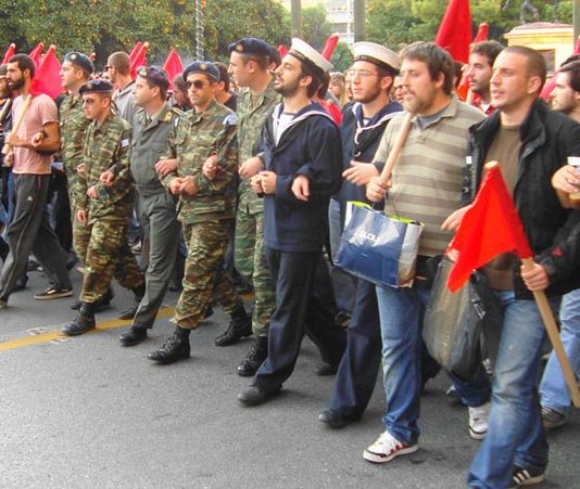 Students and conscript soldiers at the front of the demonstration