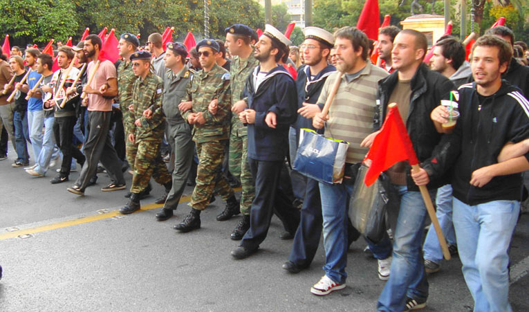 Students and conscript soldiers at the front of the demonstration