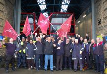 Bow busworkers out in force on their picket line yesterday morning won’t accept a wage freeze