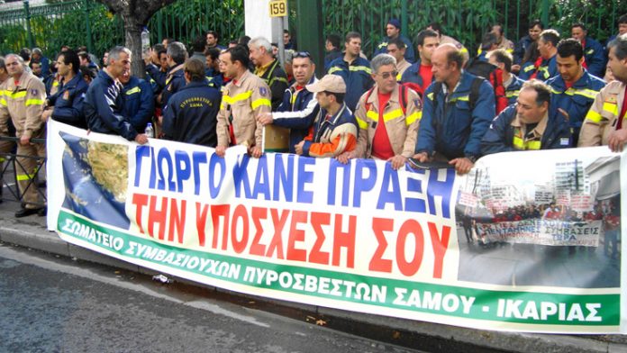 Seasonal fire-fighters outside the Ministry for Interior. Banner demands that the prime minister keeps his electoral promise to employ them on a permanent basis