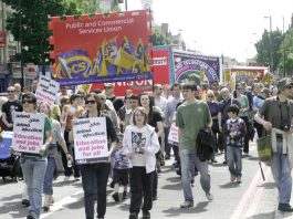 PCS banner on a march in support of London Metropolitan University workers fighting against job cuts